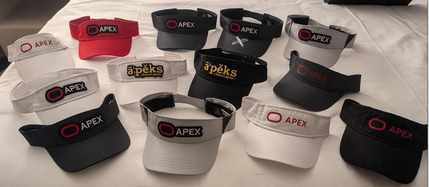 APEX-branded visor caps in multiple colorways