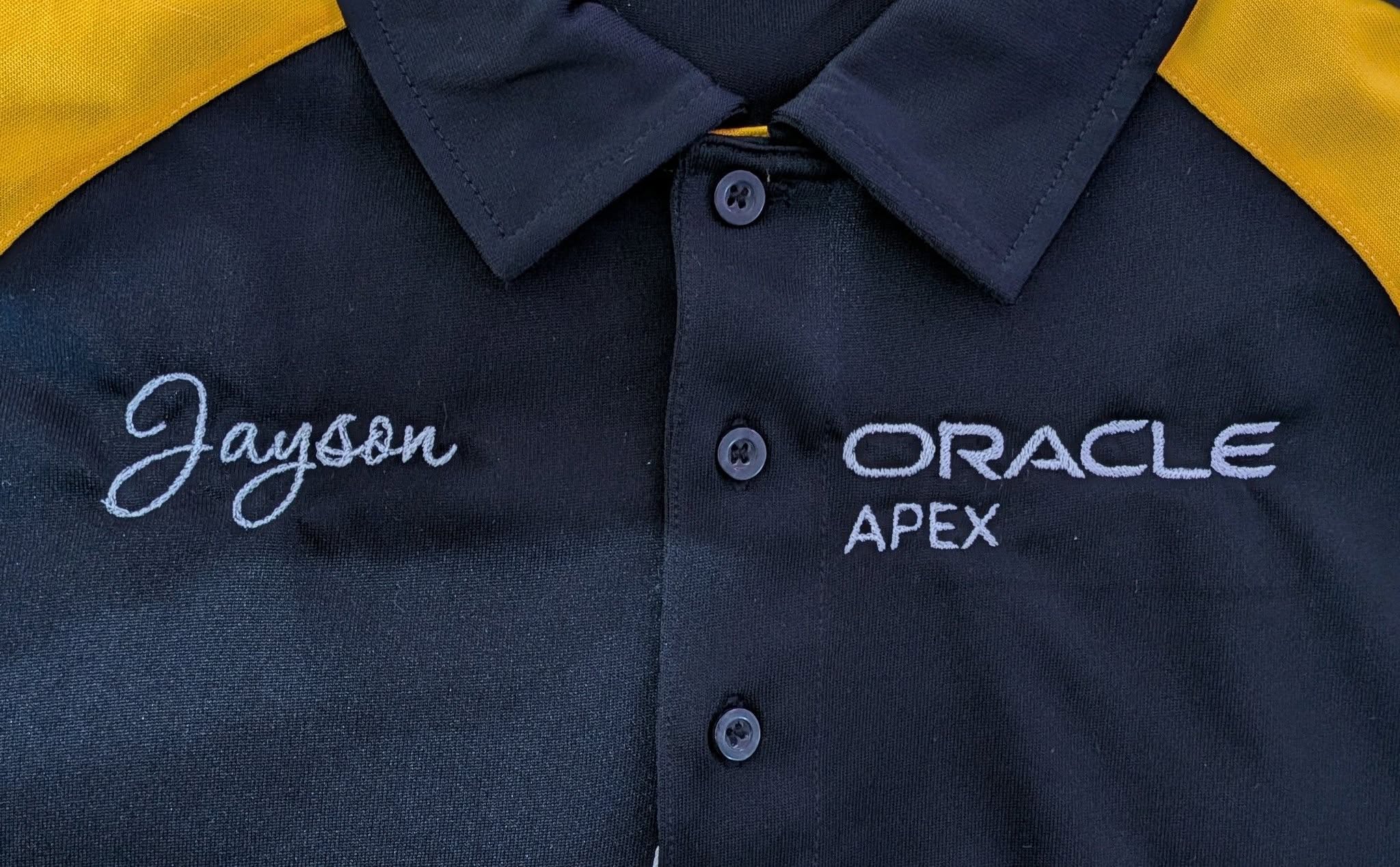 Personalized embroidered Oracle APEX polo with employee name